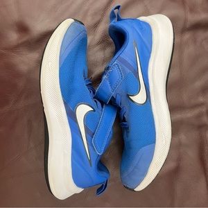 Gently used kids Nike Starrunner shoes